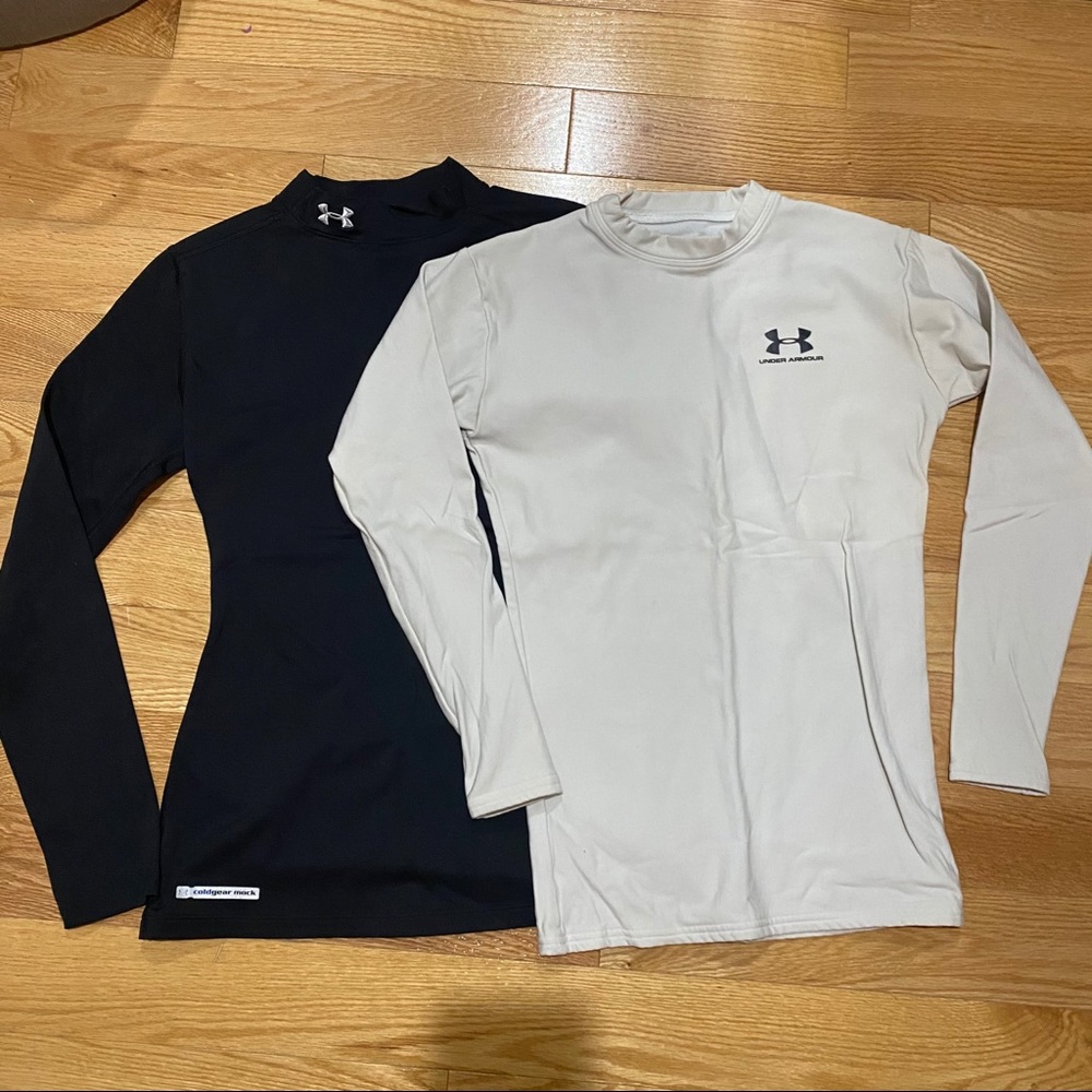 2 black and white under armour thermals